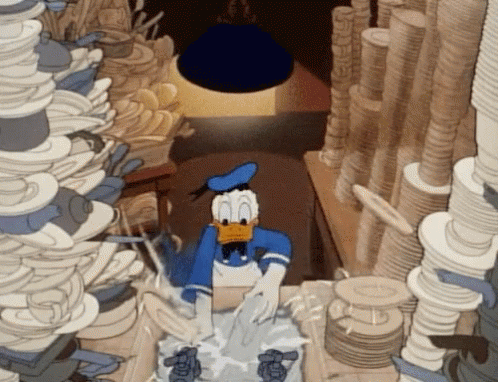 Donald Duck alone at a sink, buried under towering stacks of dirty dishes